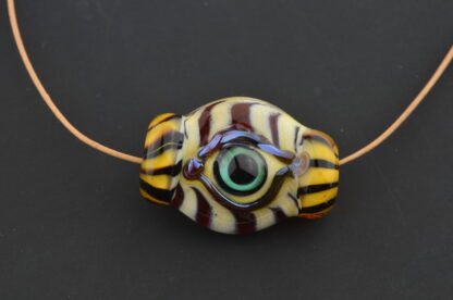ivory glass with tiger colors eye bead